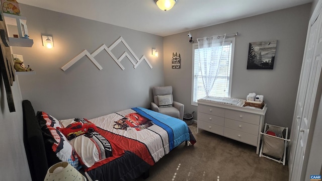 bedroom featuring carpet flooring