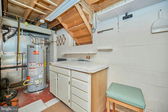 interior space with light floors and water heater