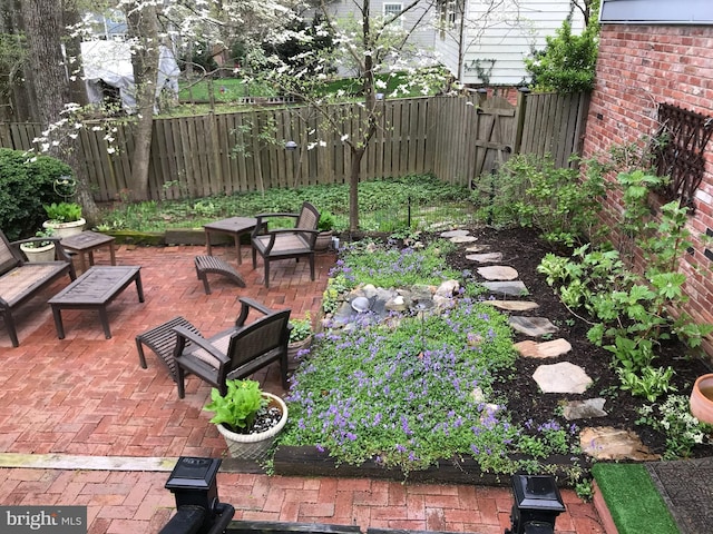 view of yard featuring a patio area and fence