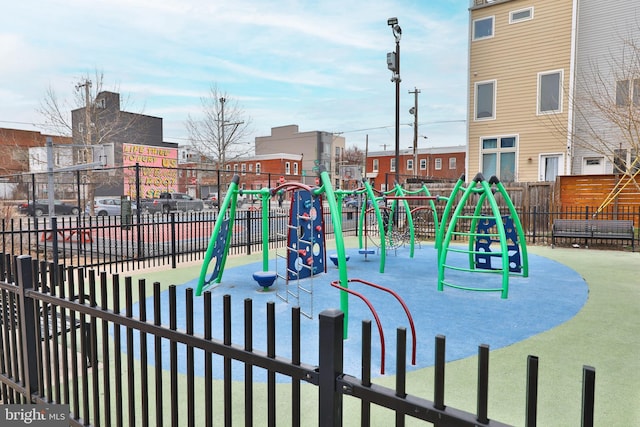 community jungle gym with fence