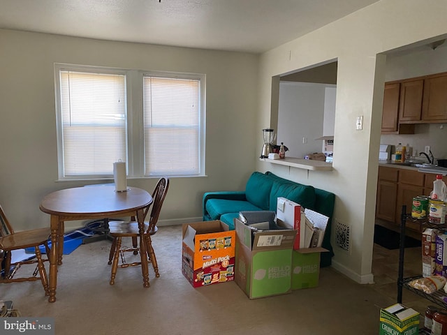 dining room with visible vents and baseboards