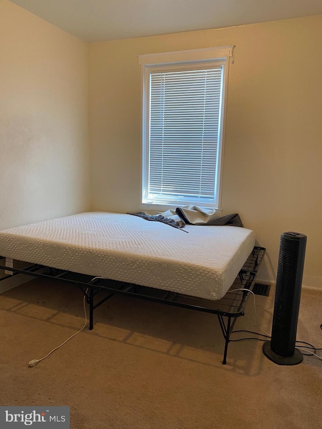 bedroom featuring carpet flooring