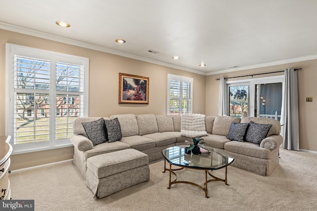 living room featuring crown molding, visible vents, and carpet floors