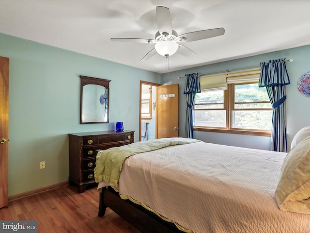 731 Fayette St, Cumberland, MD 21502 - bedroom featuring baseboards, a ceiling fan, and wood finished floors
