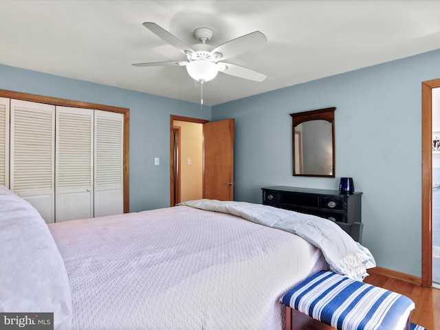 731 Fayette St, Cumberland, MD 21502 - bedroom featuring baseboards, a closet, a ceiling fan, and wood finished floors