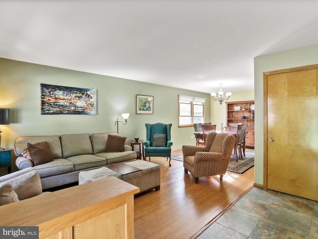 731 Fayette St, Cumberland, MD 21502 - living room with a chandelier and wood finished floors