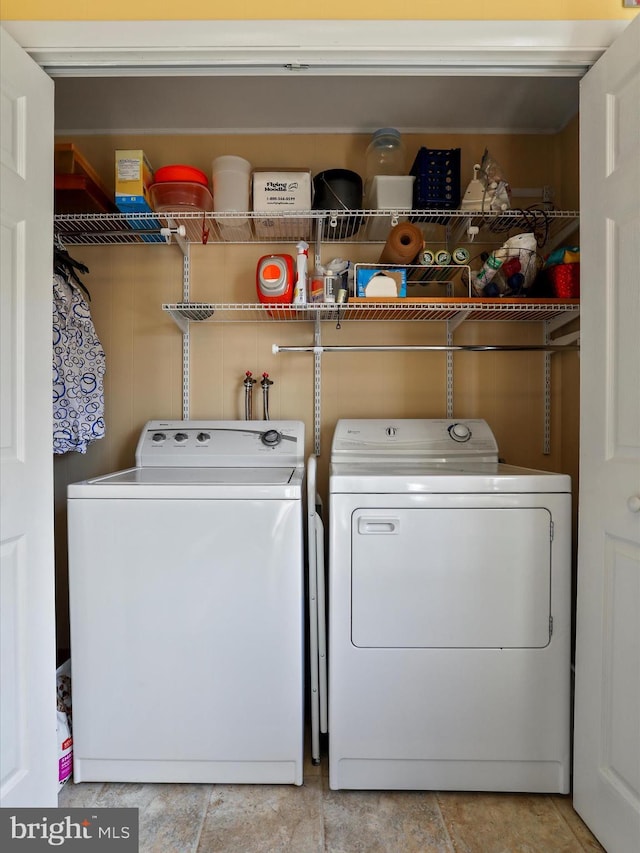 731 Fayette St, Cumberland, MD 21502 - clothes washing area featuring washing machine and clothes dryer and laundry area