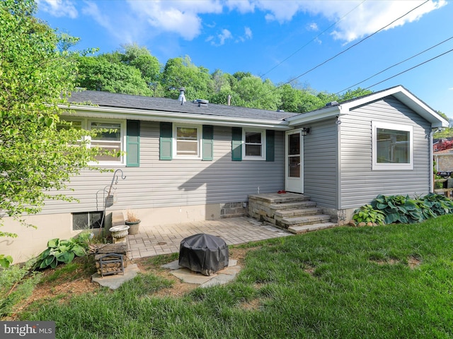731 Fayette St, Cumberland, MD 21502 - rear view of property with a yard and a patio