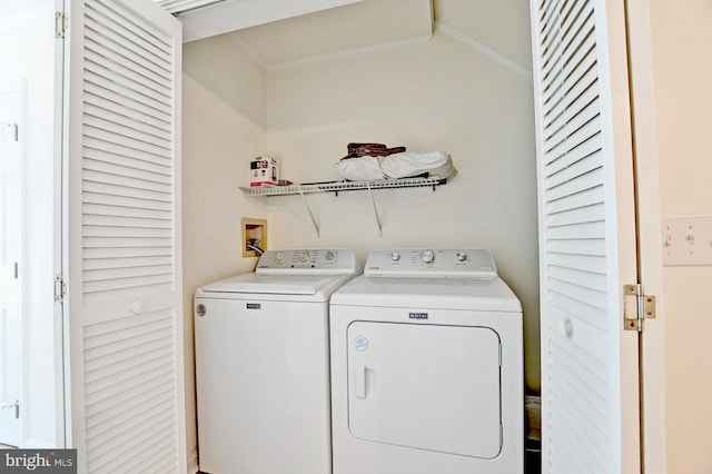 laundry area featuring laundry area and separate washer and dryer