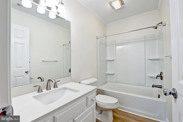 full bathroom with toilet, ornamental molding, wood finished floors, shower / bath combination, and vanity