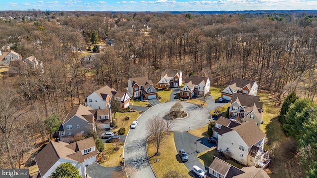 aerial view with a forest view and a residential view