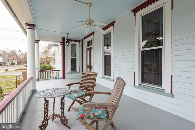 exterior space featuring a porch and ceiling fan