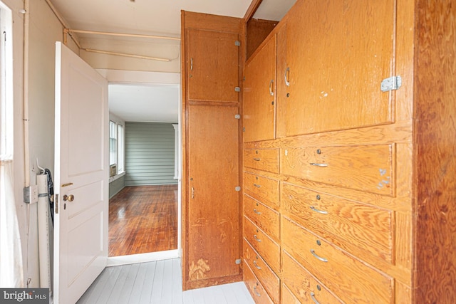 hallway with light wood-style flooring