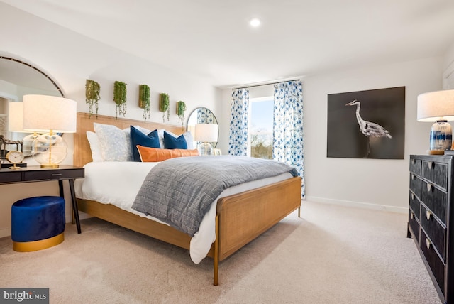 carpeted bedroom with baseboards