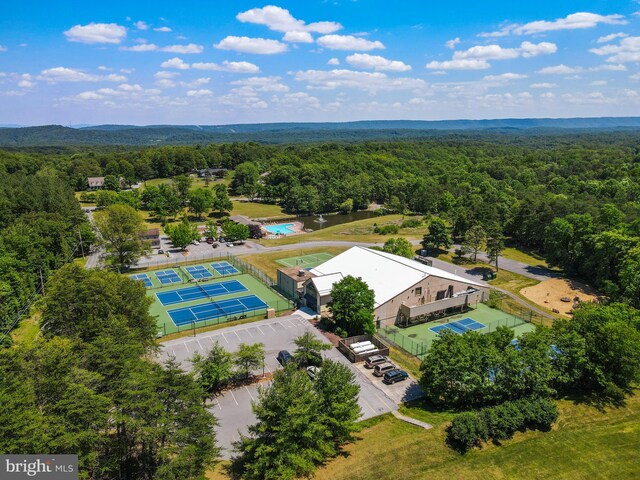 aerial view with a wooded view