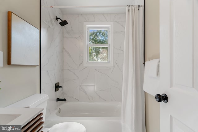 full bathroom with toilet, vanity, and shower / bath combo