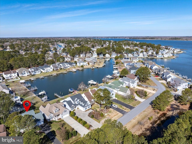 aerial view with a residential view and a water view