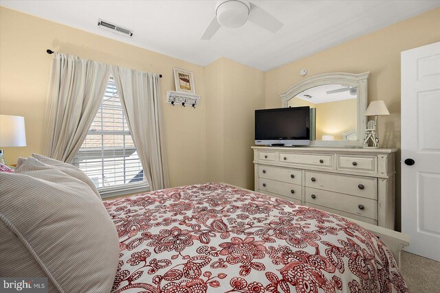 bedroom with visible vents and ceiling fan