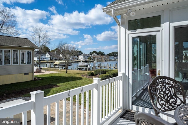 balcony featuring a water view