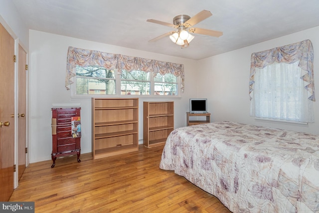 bedroom with wood-type flooring