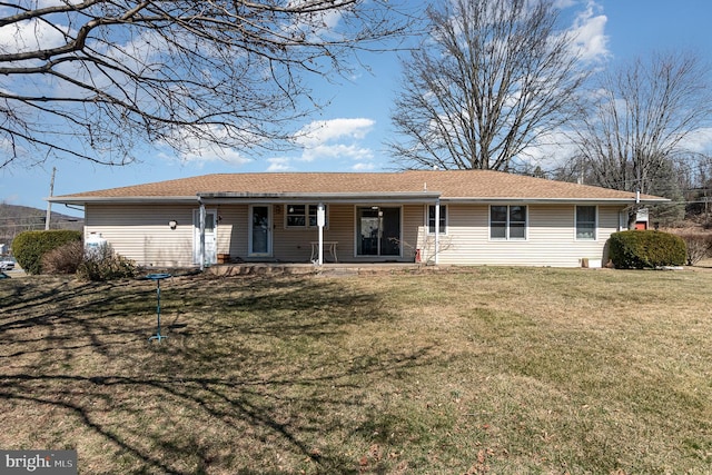 single story home featuring a front yard and a porch