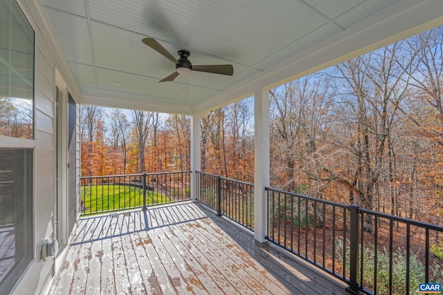 wooden deck with ceiling fan