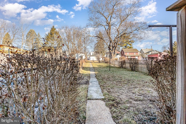 view of yard with a fenced backyard