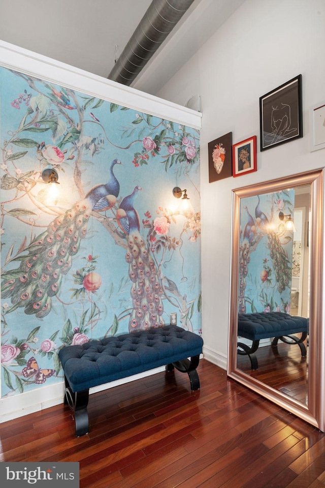 sitting room featuring hardwood / wood-style floors and baseboards