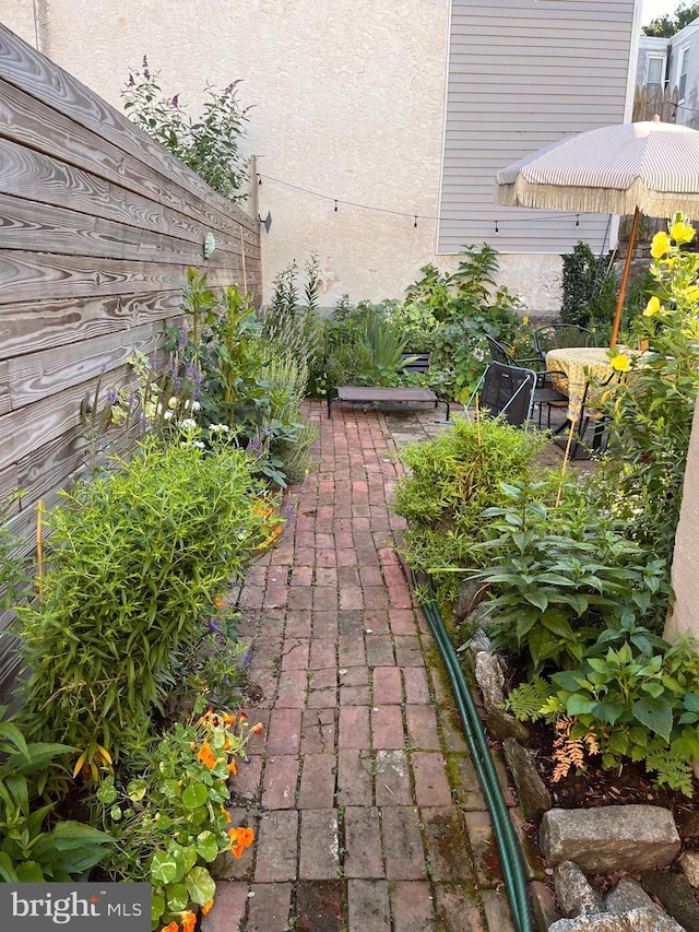 view of patio featuring a vegetable garden