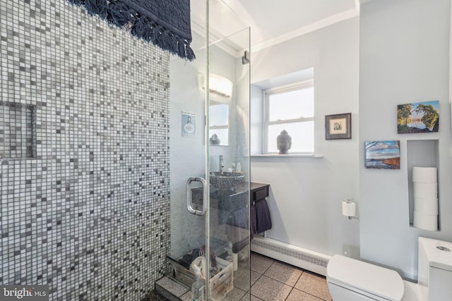 full bath with a shower stall, crown molding, baseboards, toilet, and baseboard heating