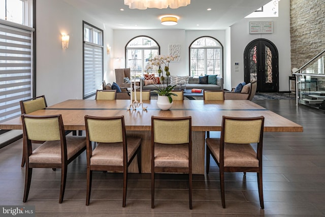 dining area featuring recessed lighting, dark wood-style floors, and french doors