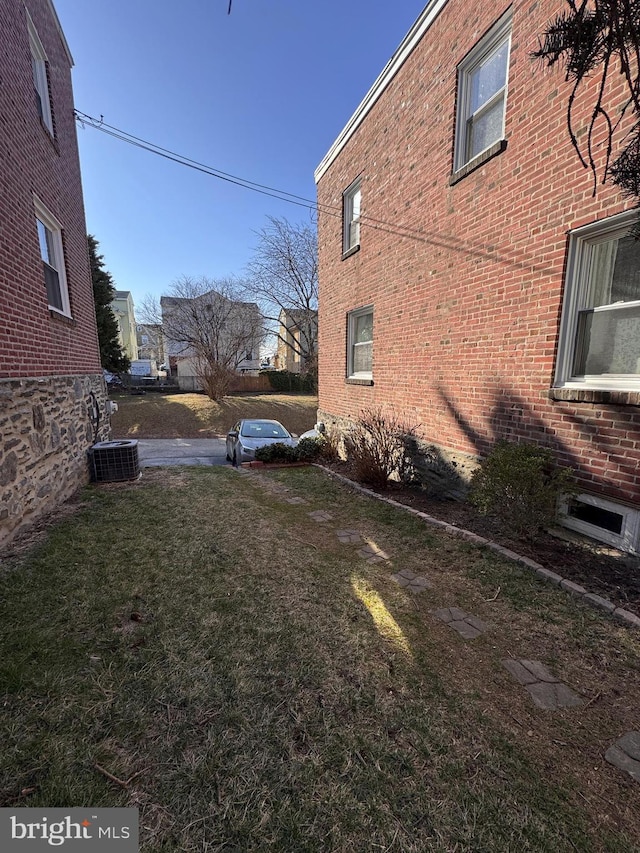 view of yard with cooling unit