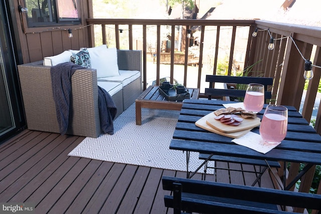 deck with an outdoor hangout area