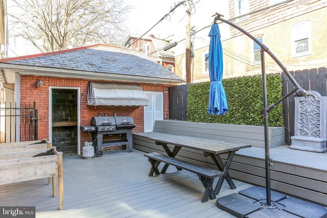 wooden deck featuring grilling area