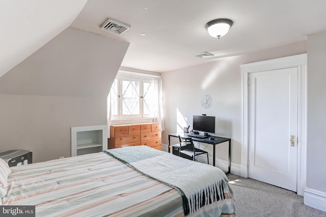 bedroom featuring carpet, visible vents, and baseboards