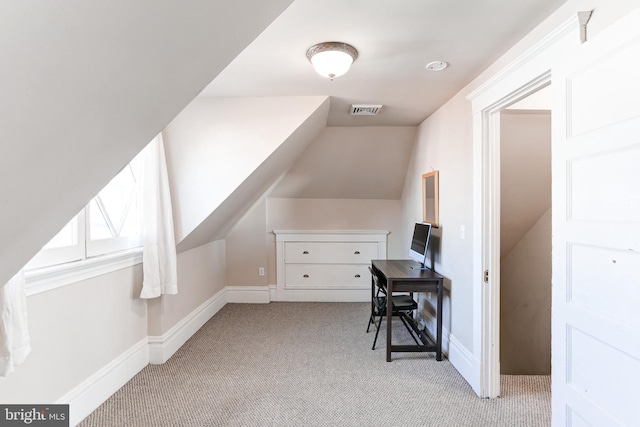 bonus room featuring baseboards, visible vents, carpet floors, and lofted ceiling