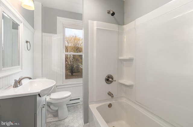 full bath with vanity, a baseboard radiator, shower / bath combination, tile patterned floors, and toilet