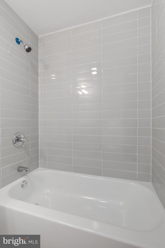 bathroom with shower / bathing tub combination