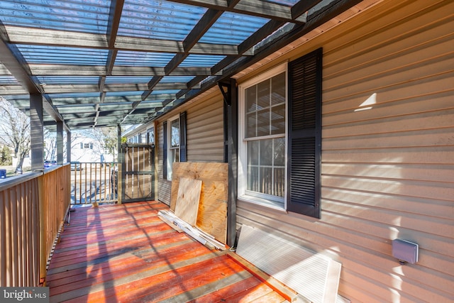 wooden terrace featuring a pergola