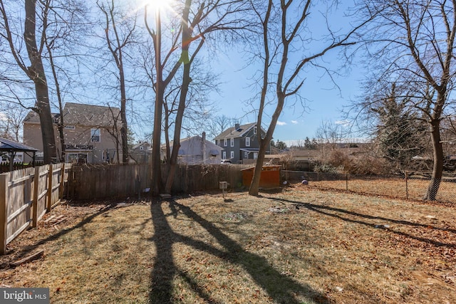 view of yard featuring a fenced backyard