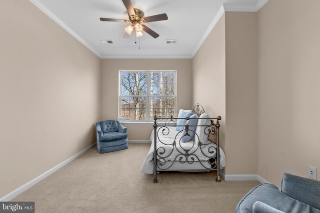 sitting room featuring carpet, visible vents, and ornamental molding