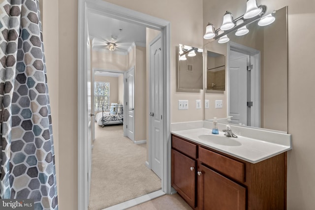 full bathroom with curtained shower and vanity