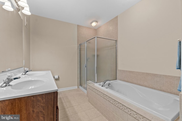 bathroom featuring a sink, a bath, a shower stall, and tile patterned floors