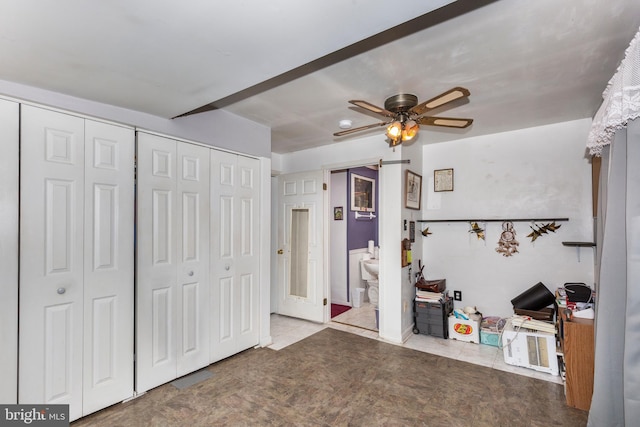 interior space with a ceiling fan