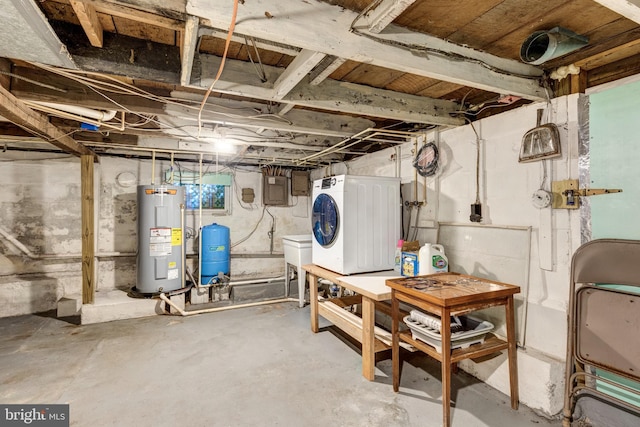 basement with washer / clothes dryer and electric water heater