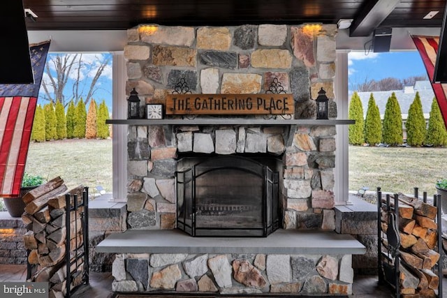 exterior details with stone siding and an outdoor stone fireplace