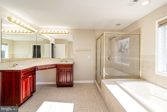 bathroom with visible vents, vanity, and a shower stall