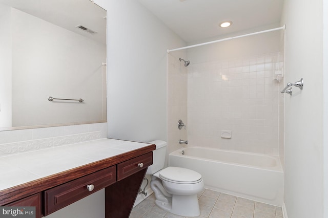 full bath with visible vents, toilet,  shower combination, tile patterned flooring, and vanity