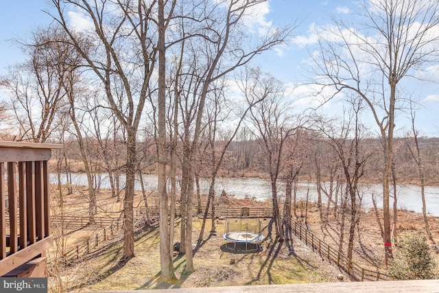 water view featuring fence