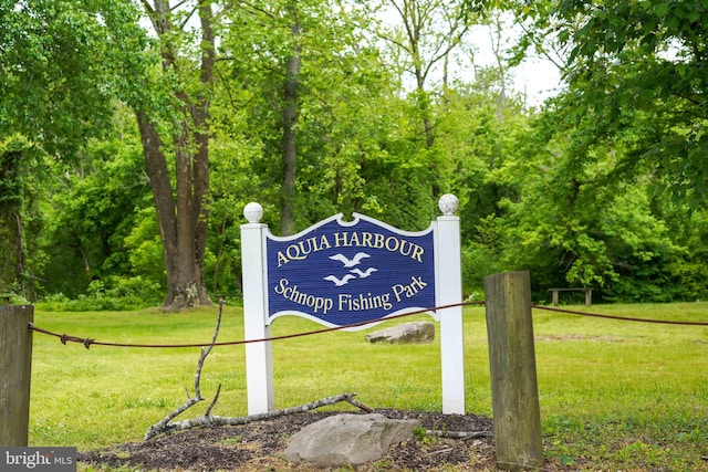 community sign with a lawn